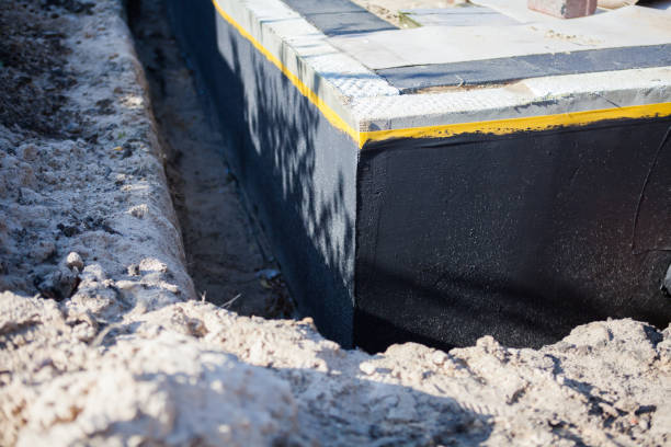 Professional Exterior Waterproofing technician working in Oakley, KS